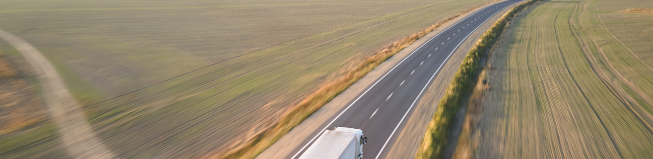 aerial-view-of-blurred-fast-moving-semi-truck